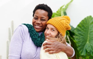 Happy friends smiling